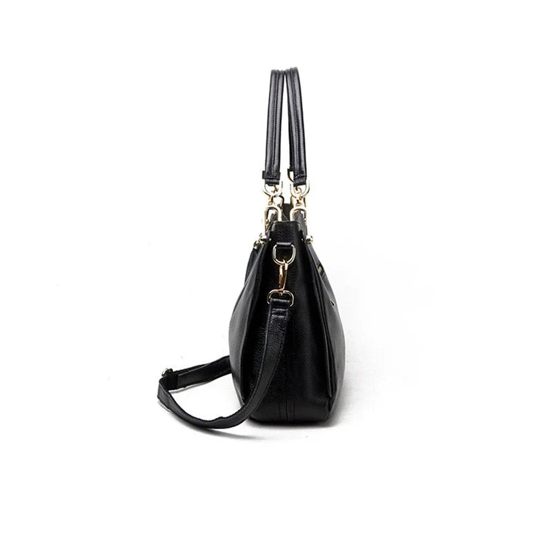 Black Antiqued Leather Slouch Shoulder Bag with Gold Chain Tassel